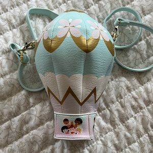 Adorable, never used, It’s a Small World balloon bag. Authentic Disney Parks.